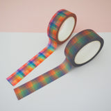 Two rolls of washi tape with a checked pattern. One is brightly coloured and the other is in dusky rainbow hues.