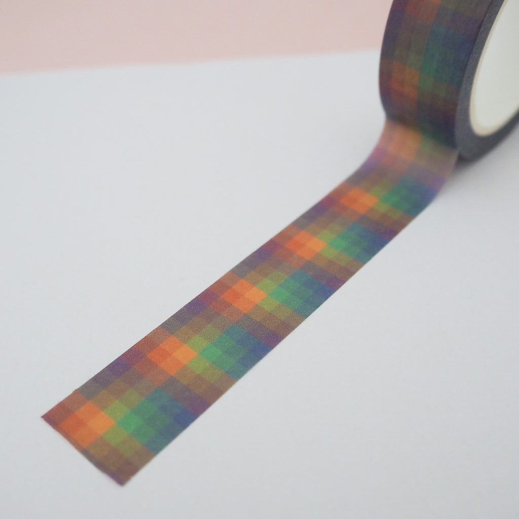 Washi tape with a checked pattern in dusky rainbow colours.