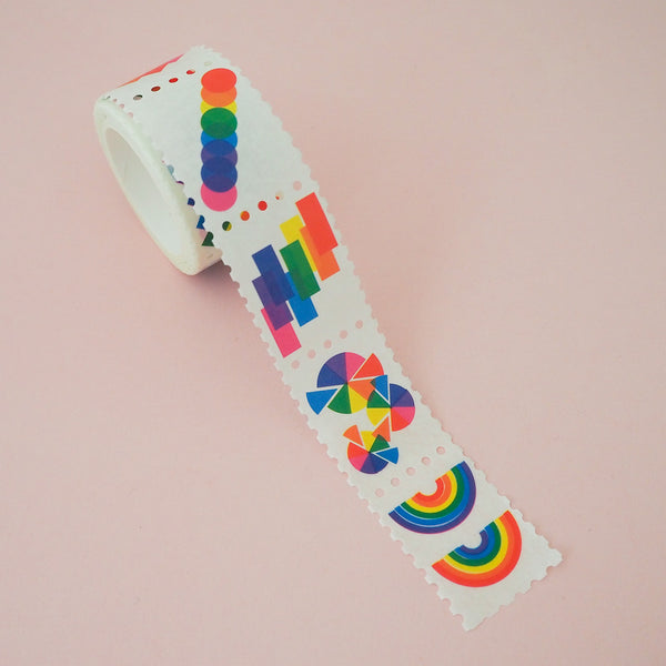 Roll of washi tape in a stamp style with perforated edges. Each stamp has a different design featuring rainbows and brightly coloured shapes.