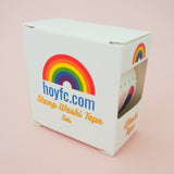 A colourful roll of washi tape in a gold foil-printed, windowed box.