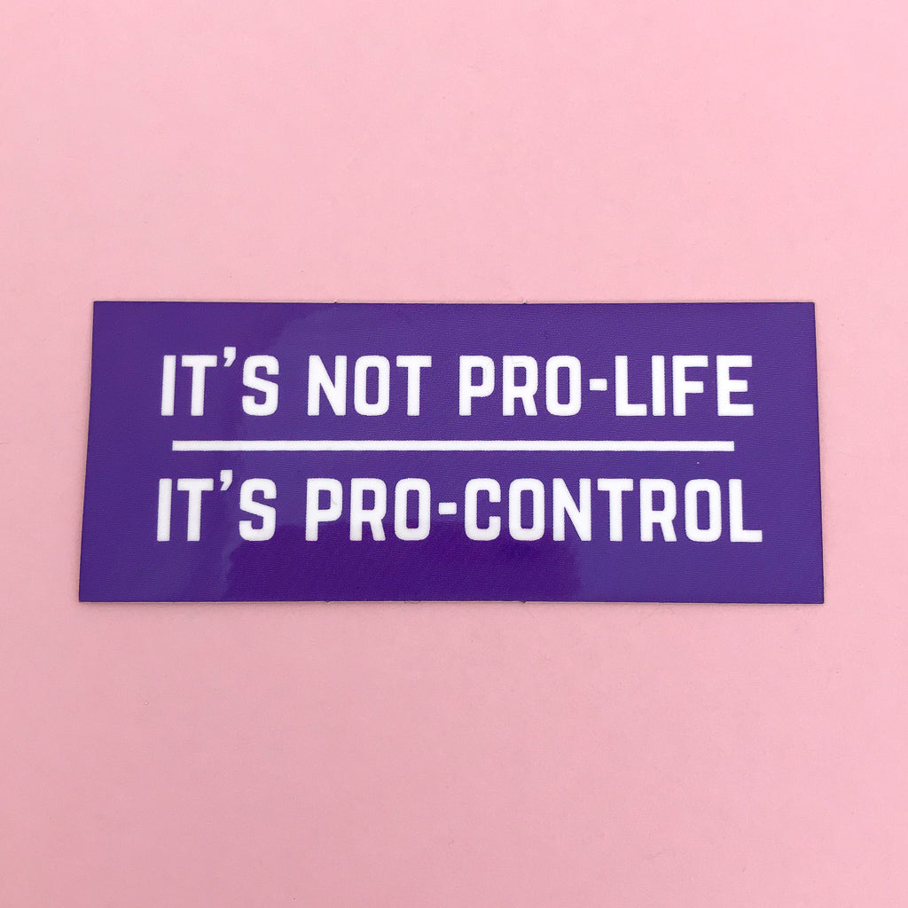 Rectangular vinyl sticker in a deep purple colour. The rectangle is divided horizontally by a white line. It read It's Not Pro-Life above the line and It's Pro-Control below in white capitals.